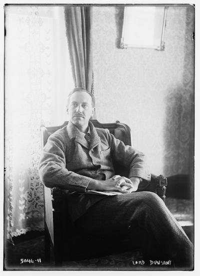 Lord Dunsany, seated in suit and tie.