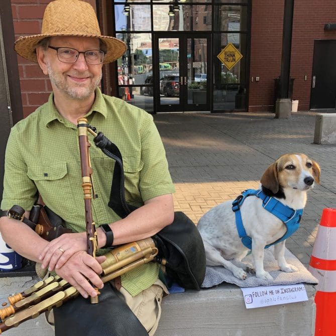 Tom Klein with Opal the busking companion